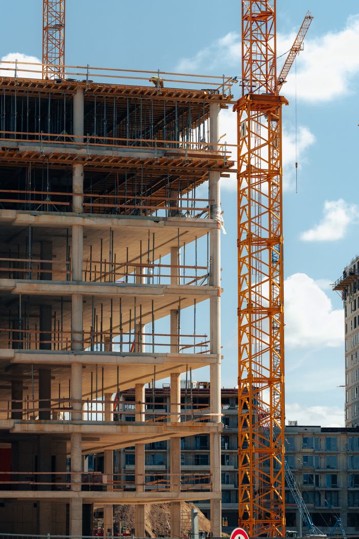 Services View of a mid-construction high-rise with cranes in Bratislava, Slovensko.